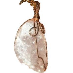 Hand crafted rose quartz crystal stone pendant